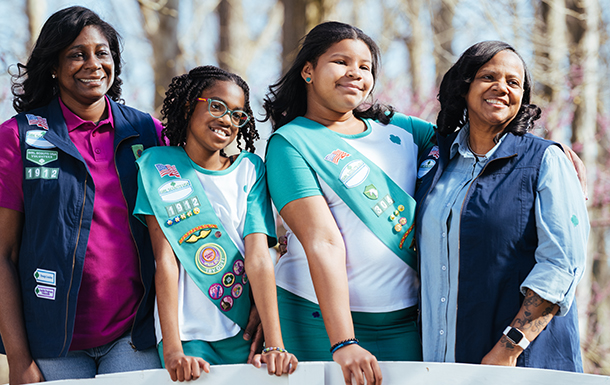 Volunteers with Girl Scouts